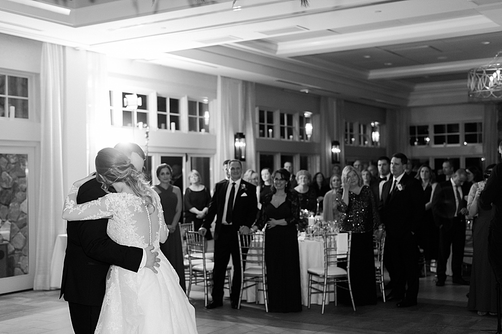 bride and groom first dance in black and white